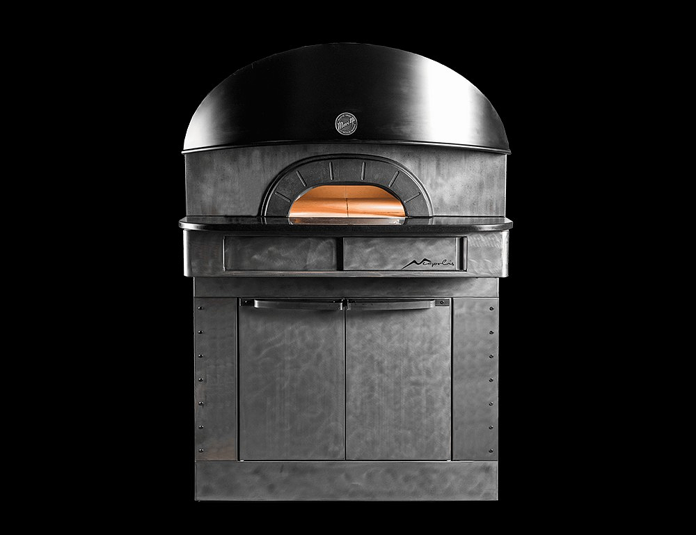 No, there is no BAN on coal and wood-fired ovens in NYC. BUT…