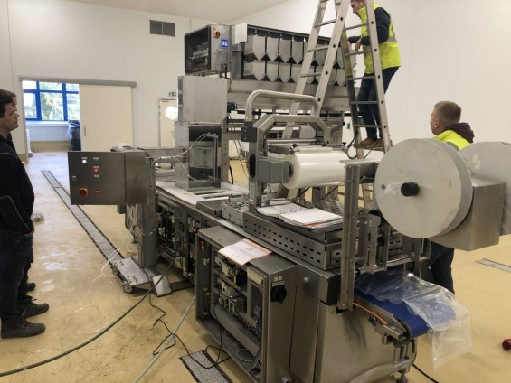 AUTOMATIC WEIGHING, FILLING AND THERMOFORMING LINE