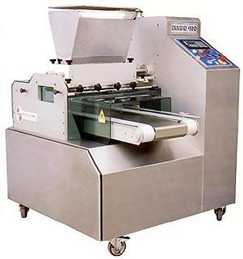 Bakery professional reviewing depositor equipment