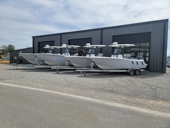 New center console boats lined up outside the showroom