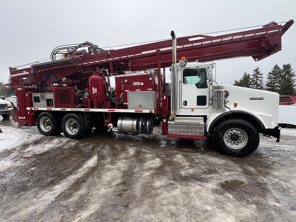 Used Drilling Rigs & Flattank Support Trucks