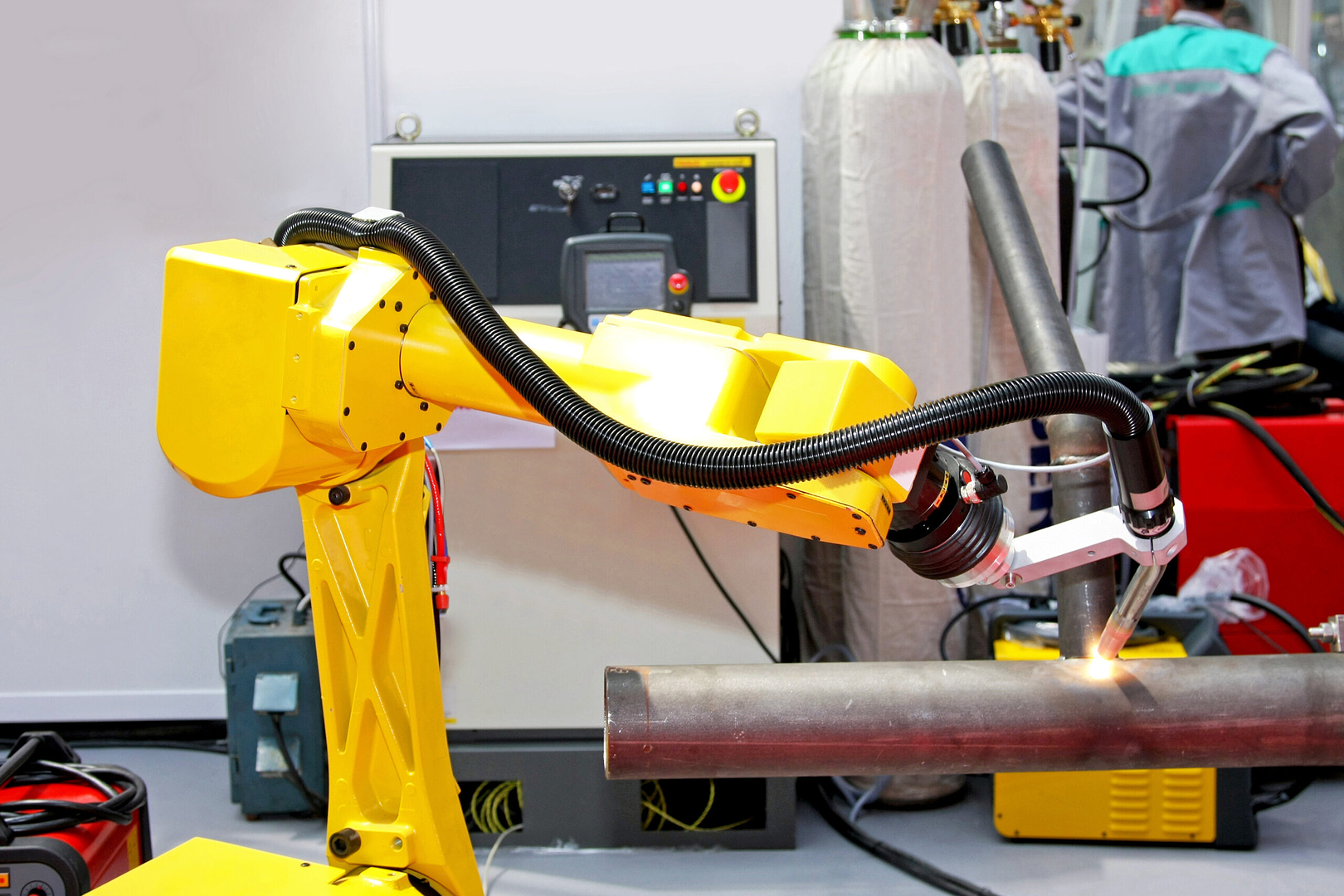Technician working with a Fanuc robot during hands-on training