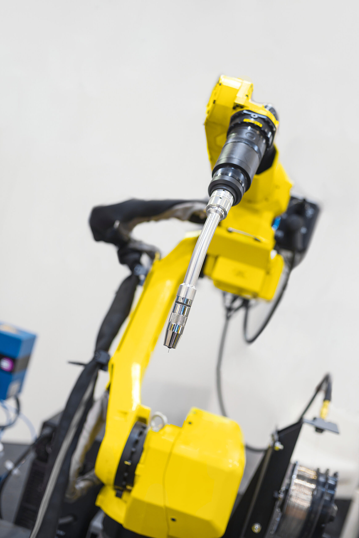 Close-up of a robot tool integrated into a production line