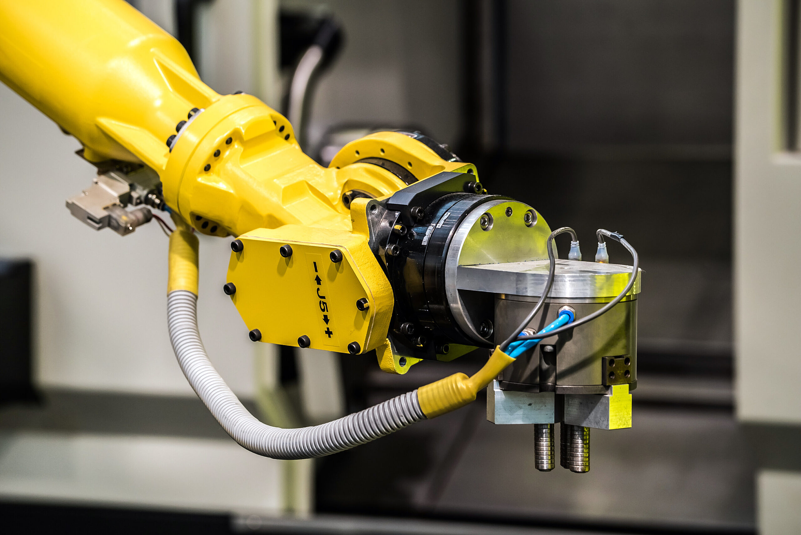 Fanuc robot tending a CNC machine at Robot World Automation