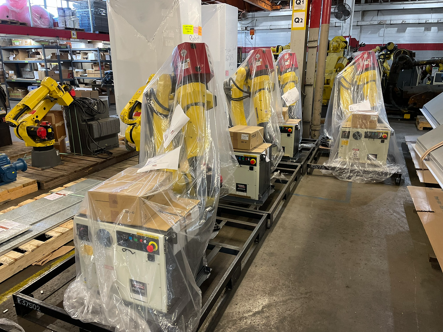 Fanuc robots wrapped and staged for deployment at Robot World Automation