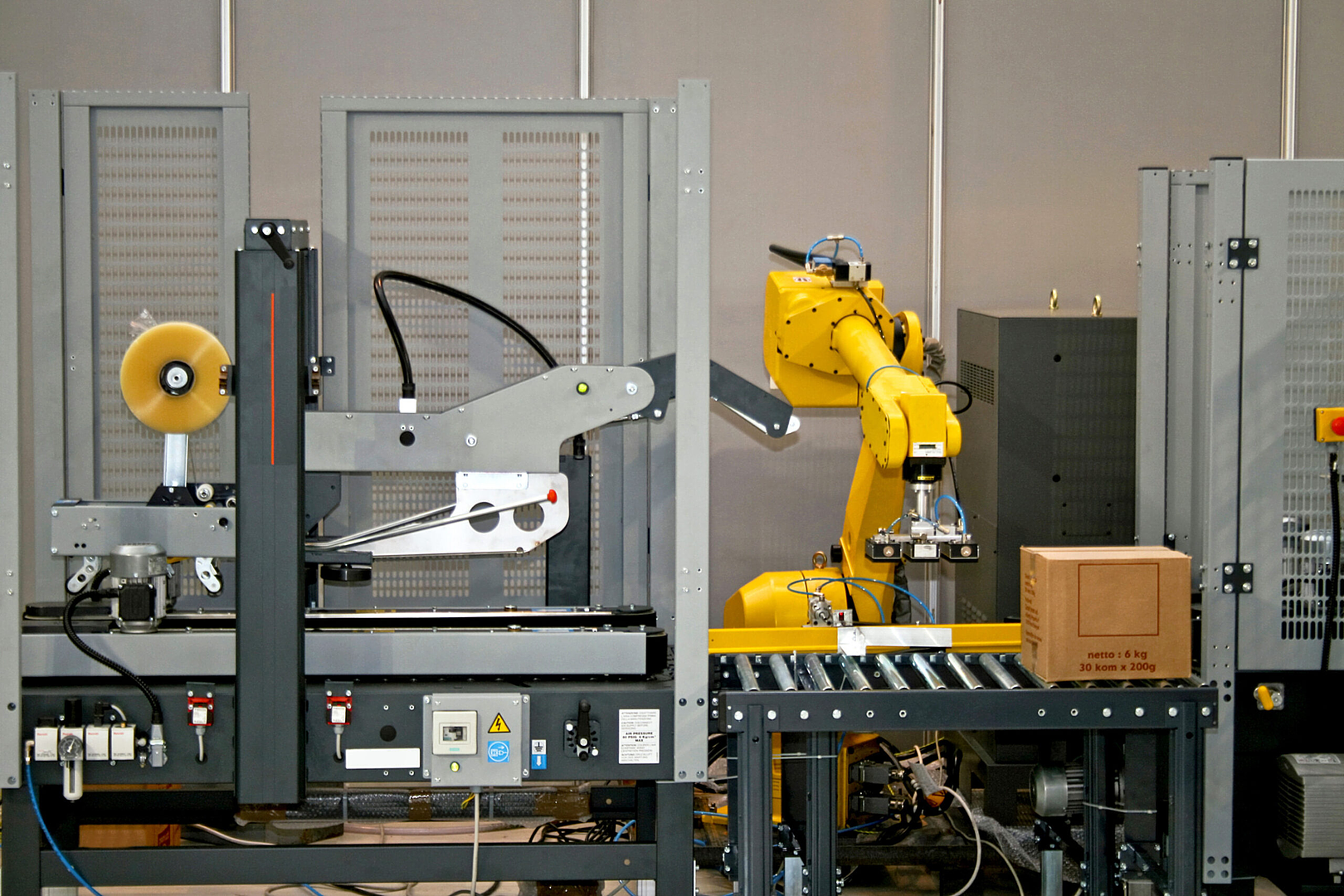 Robot integration cell handling finished parts on the line