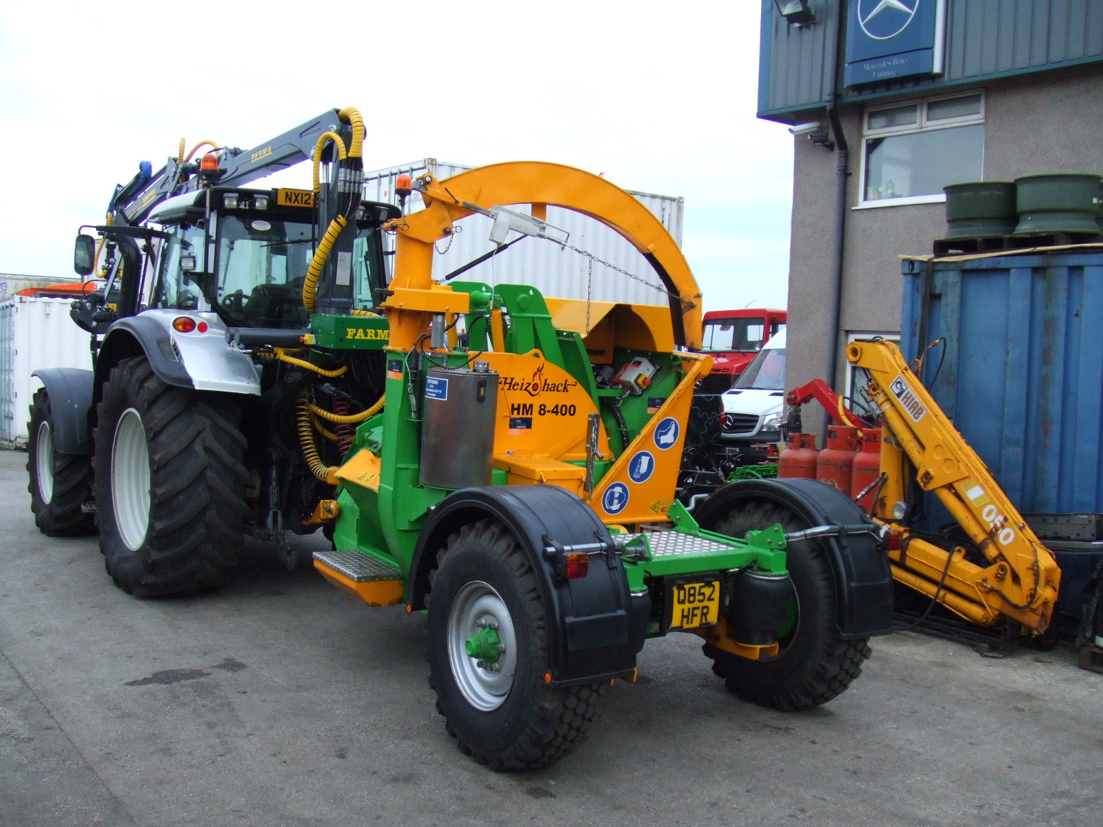 50KM/HR VALTRA WITH JAKE CRANE AND HEIZOHACK CHIPPER SET-UP