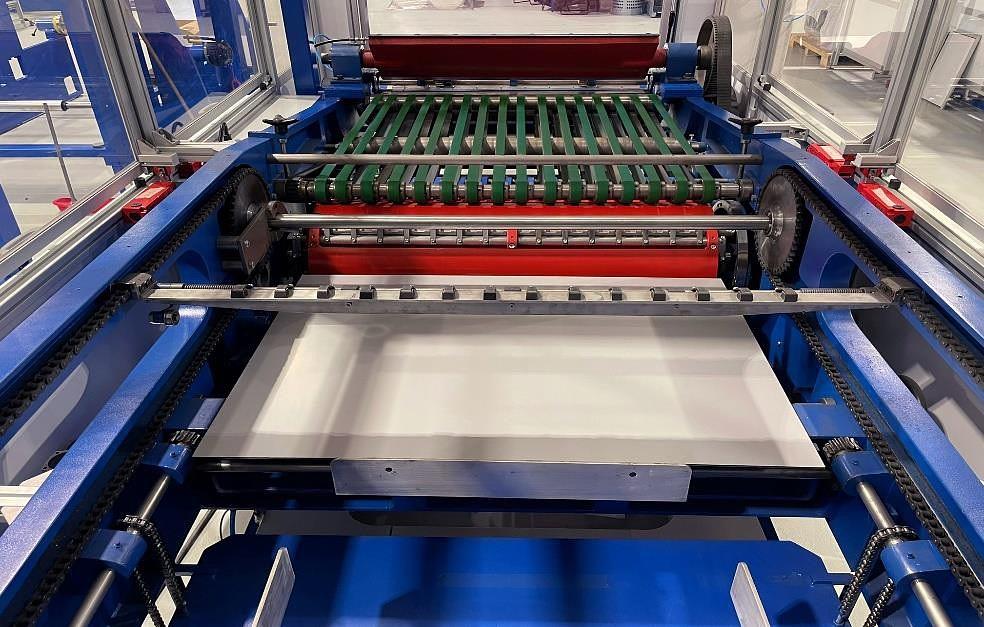 Investing in a sheeter for cutting material from rolls to sheets