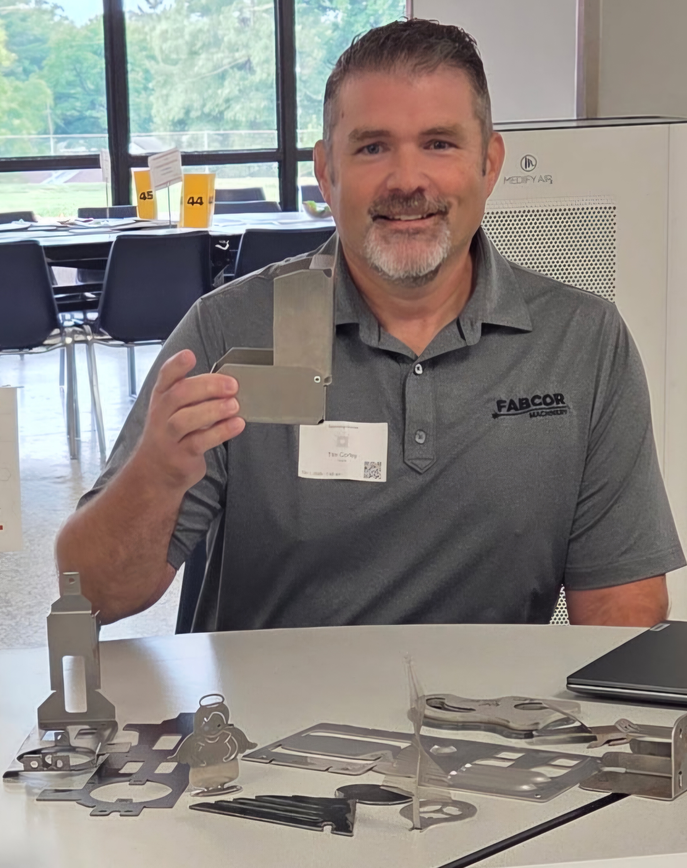 Fabcor Machinery Volunteers at Junior Acheivement Career Fair for Metal Fabrication Table