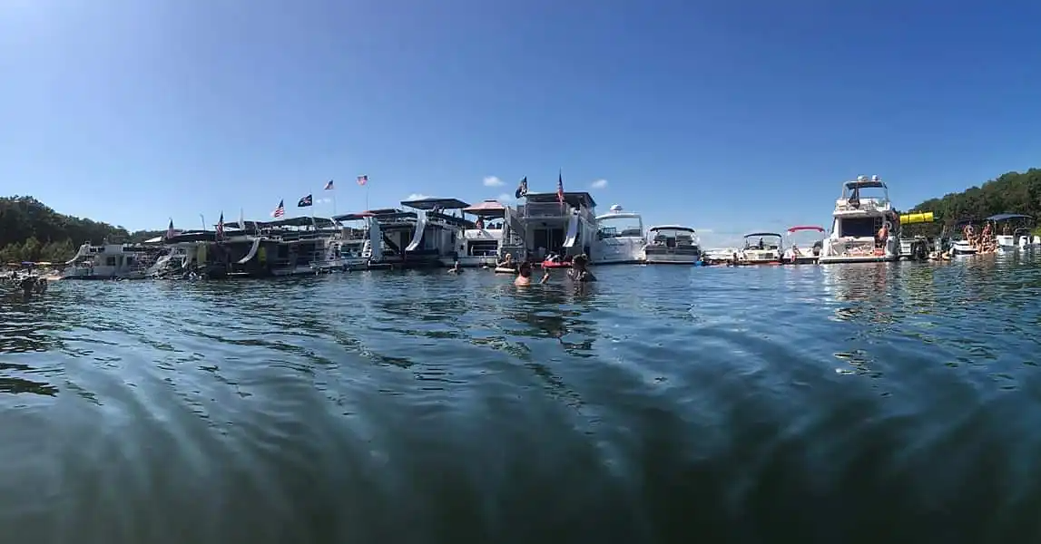 Boats gathered together on Stockton Lake near Mutton Creek Marina