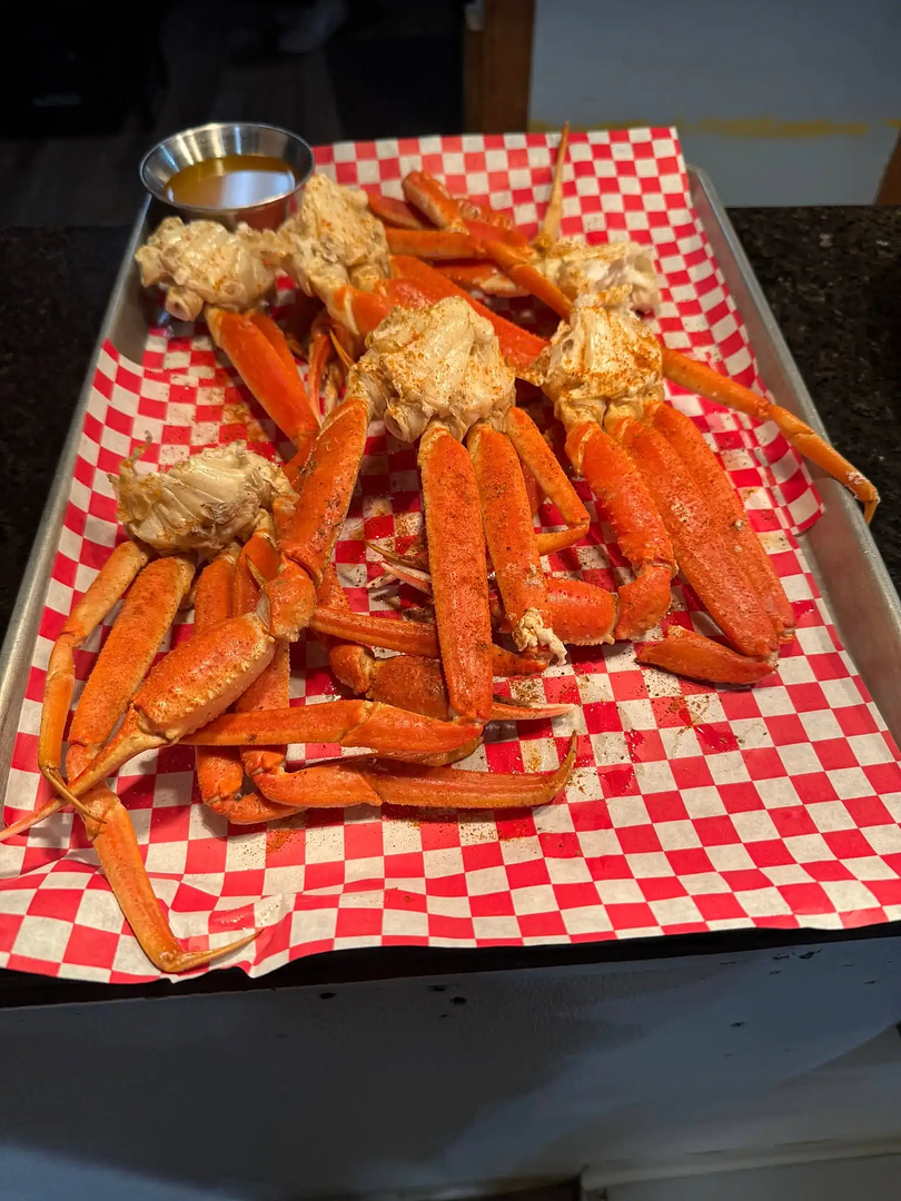 Crab legs and fries served at No Wake Oasis