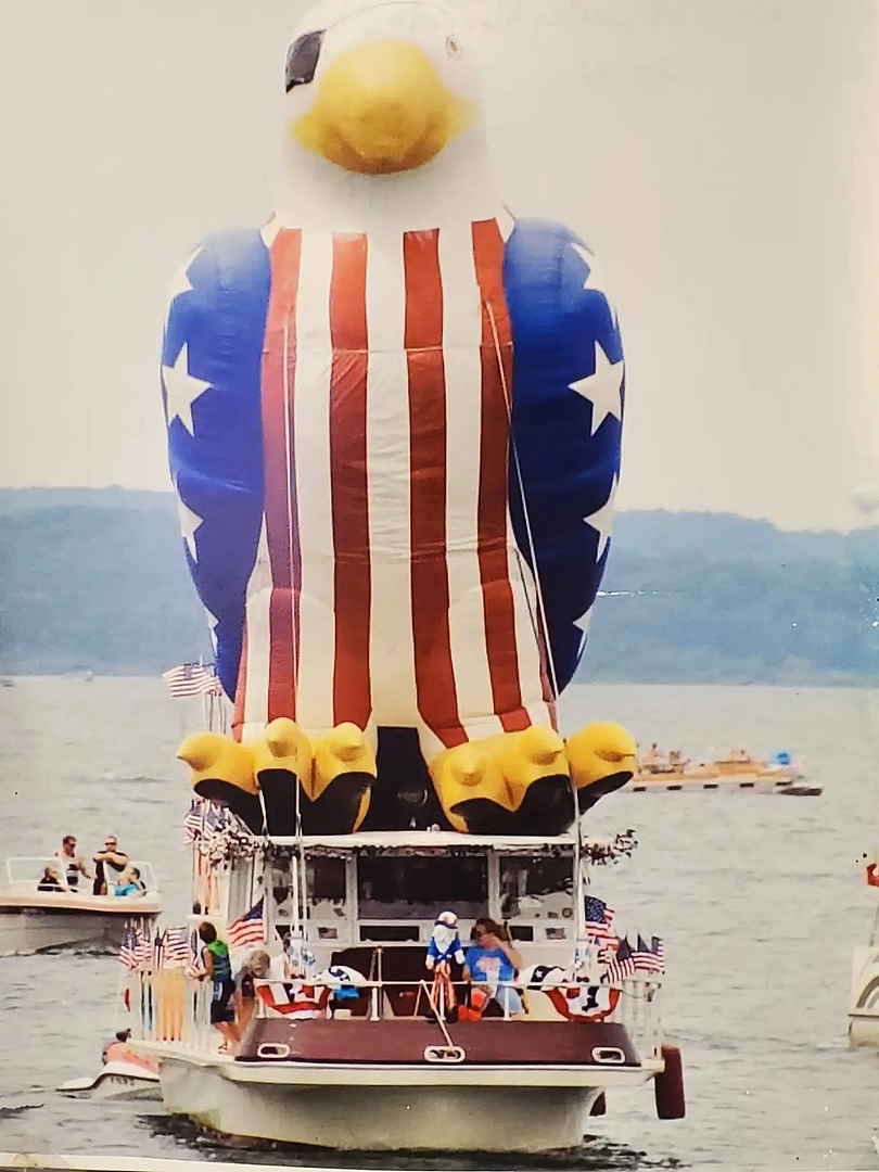 Fourth of July parade balloon on the water near Mutton Creek Marina