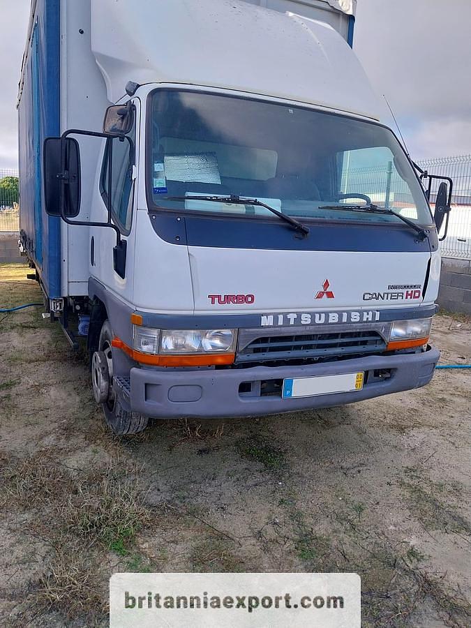 Left Hand Drive Mitsubishi Canter FE659 7.5 Ton Curtainsider Truck for Sale – Export Ready