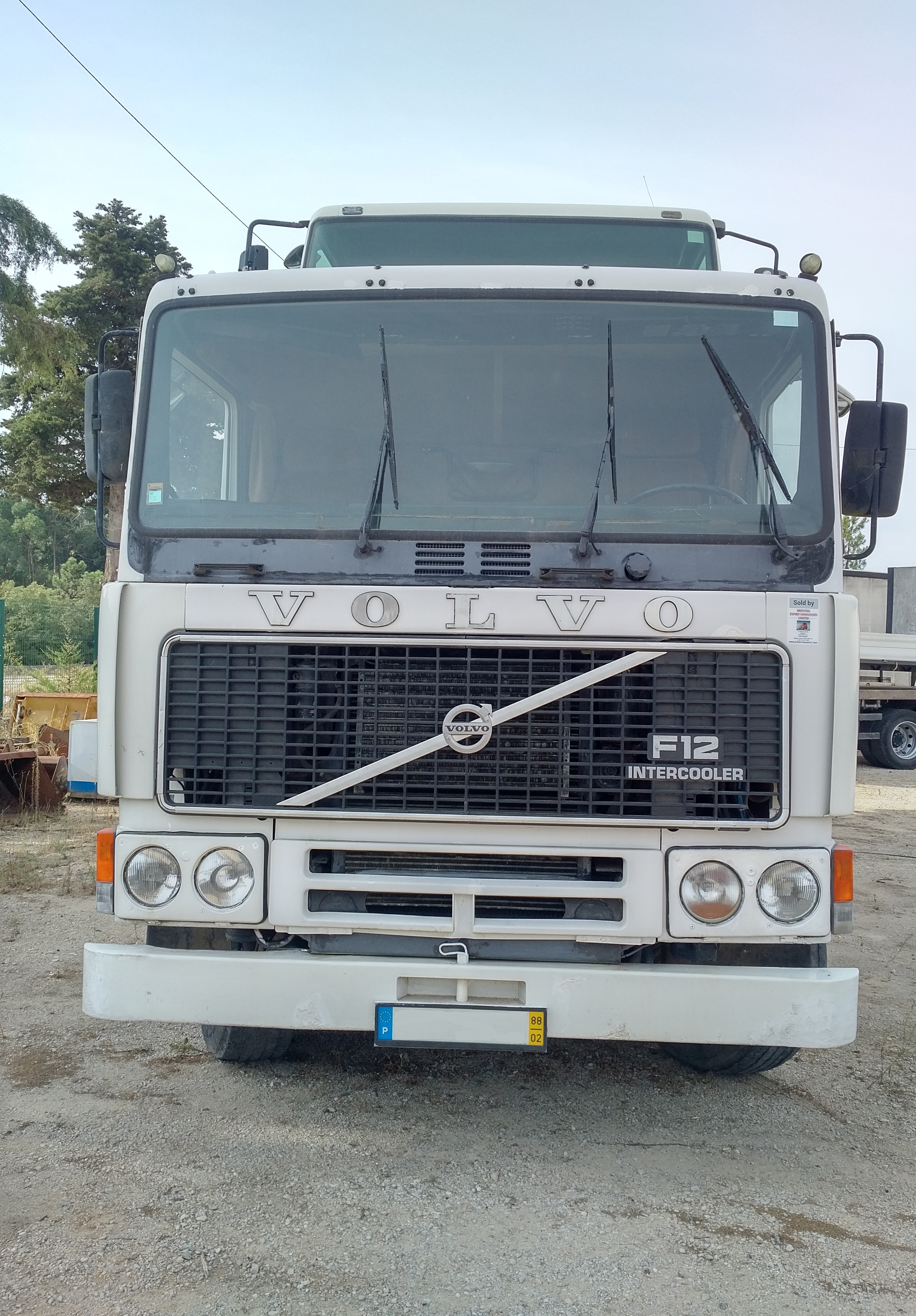 Volvo F12 360 6X2 tipper loaded with DAF 85 360 ATI 6X4 tipper & 2 x FIAT 640 farm tractors sold to Nigeria.