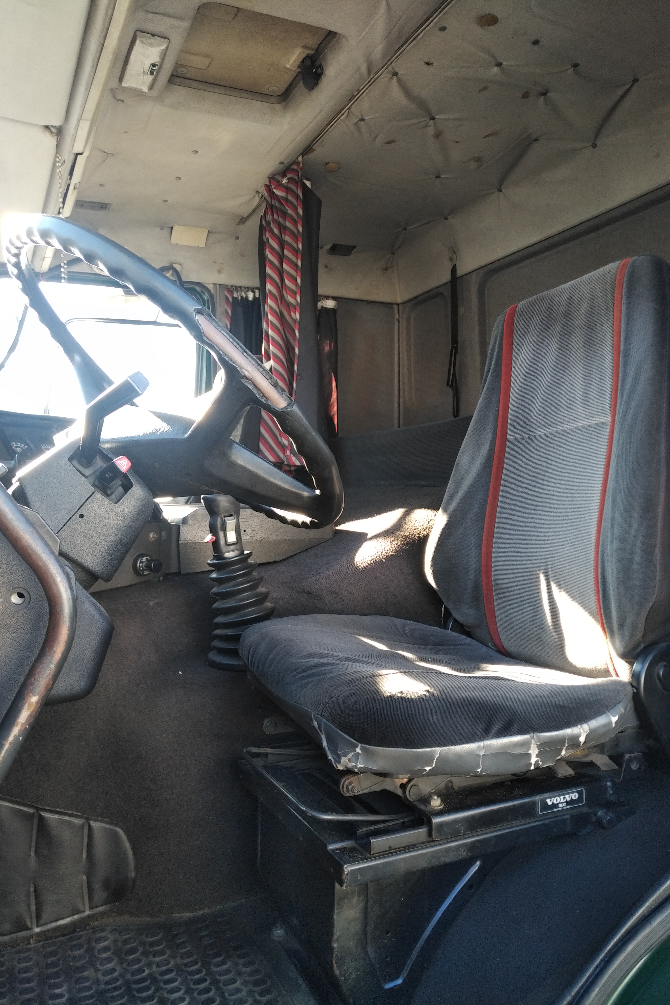 Left hand drive Volvo FL10 320 6X2 10 tyres 26 ton curtainsider truck recently sold to Lagos - Nigeria.