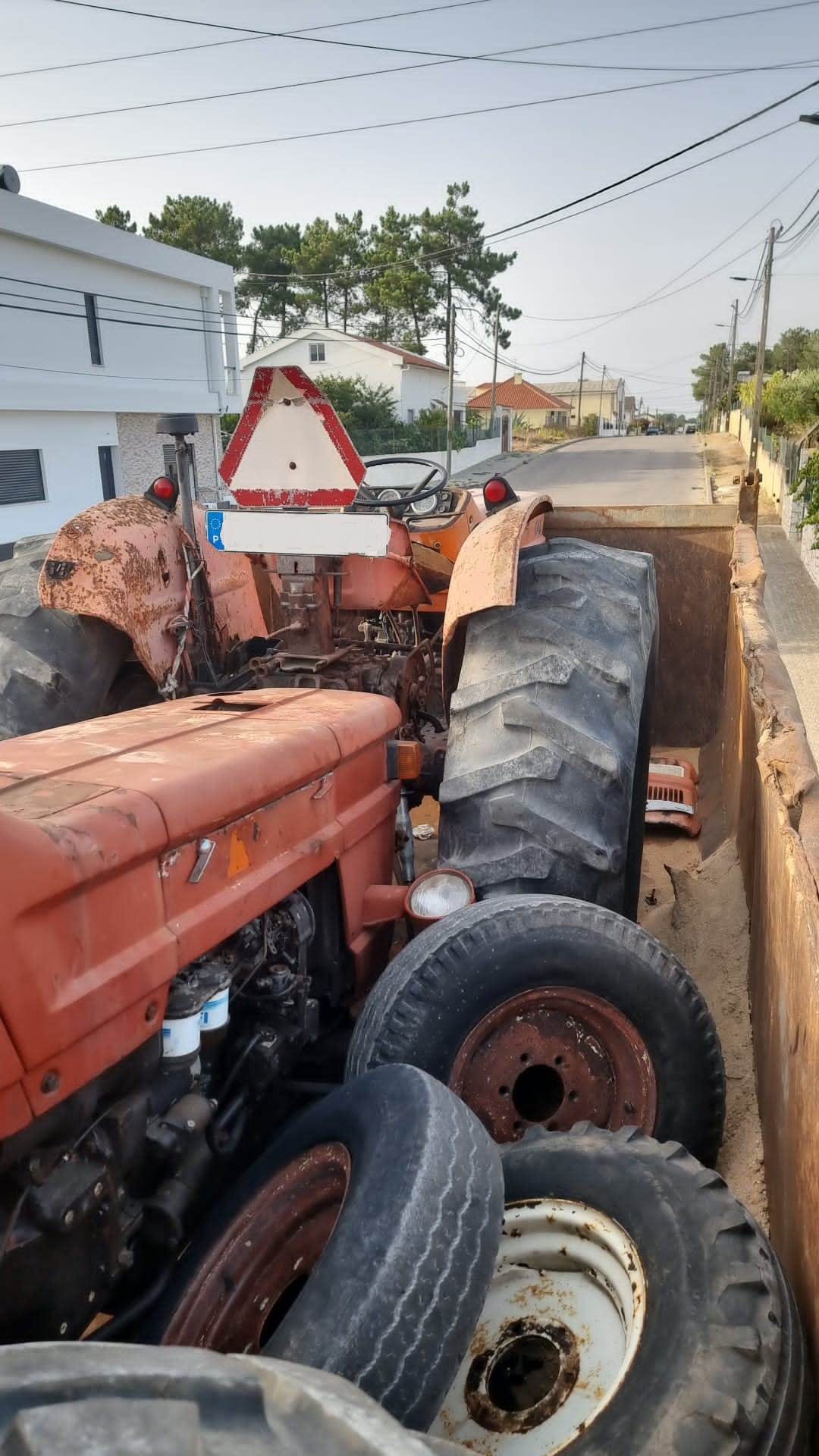 Transport of DAF 85 360 ATI 6X4 tipper loaded with 2 x FIAT 640 farm tractors.