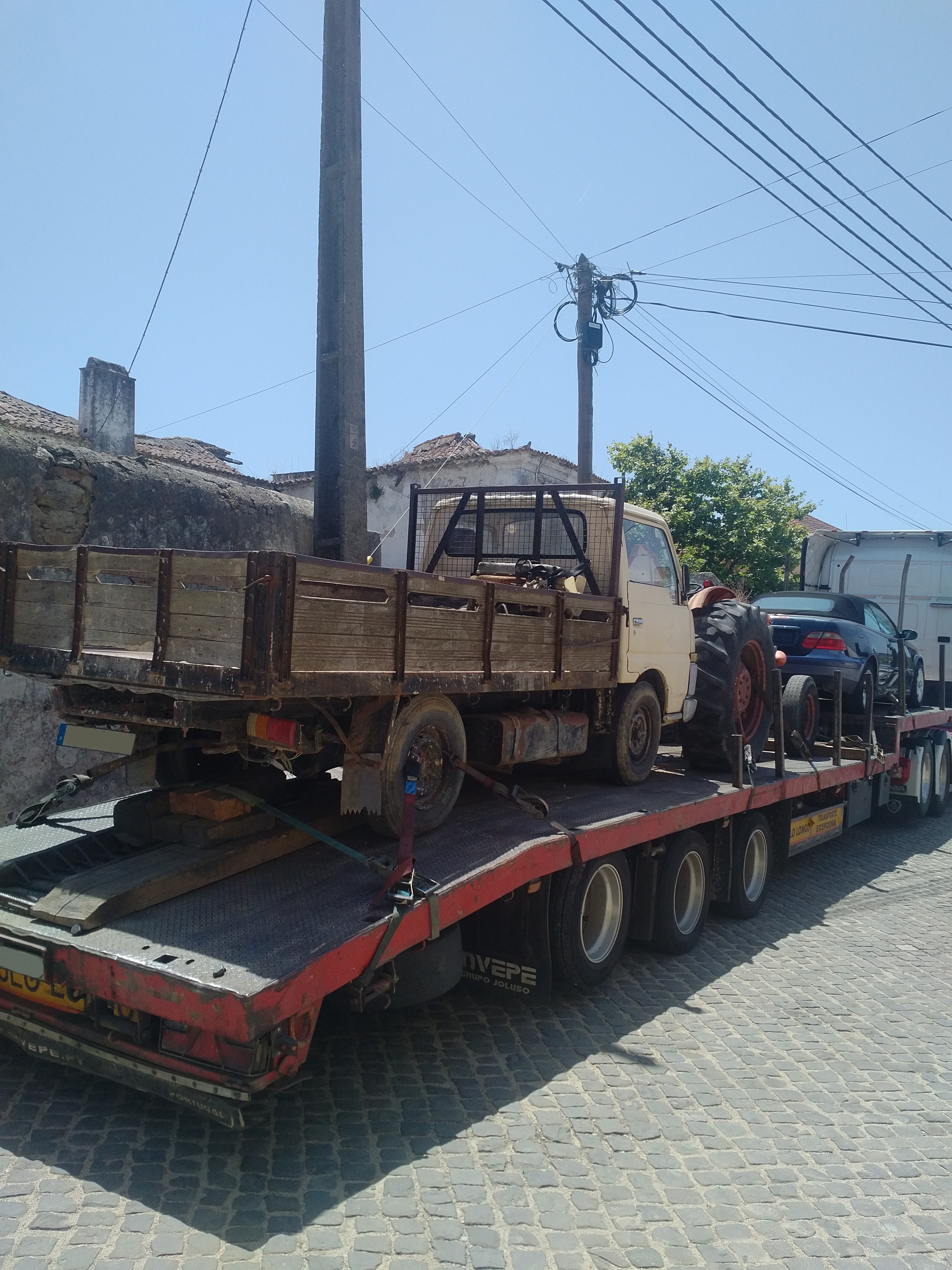 Transport & Delivery of Nissan Cabstar pick up truck & FIAT 640 farm tractor.