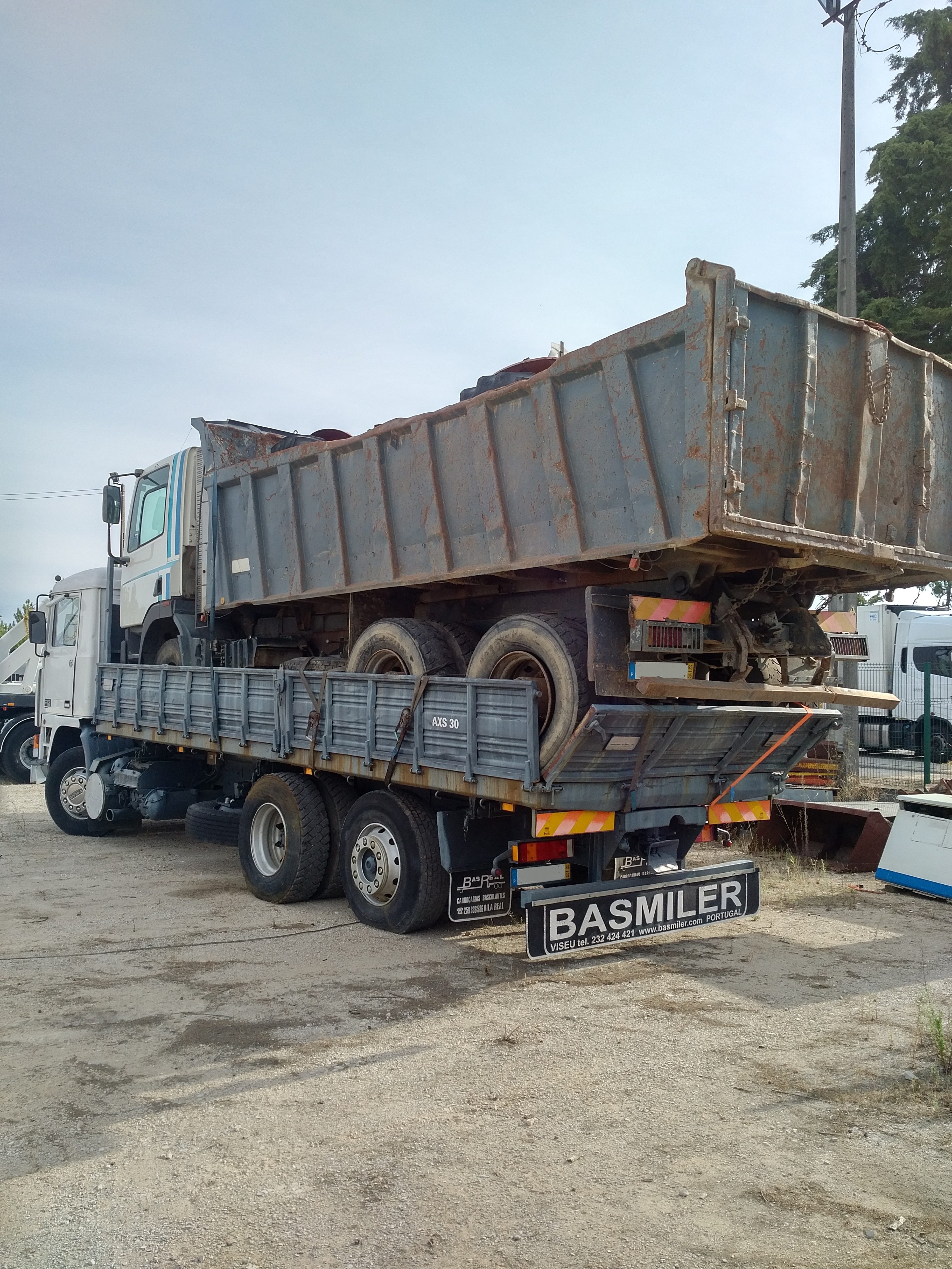 Volvo F12 360 6X2 tipper loaded with DAF 85 360 ATI 6X4 tipper & 2 x FIAT 640 farm tractors sold to Nigeria.