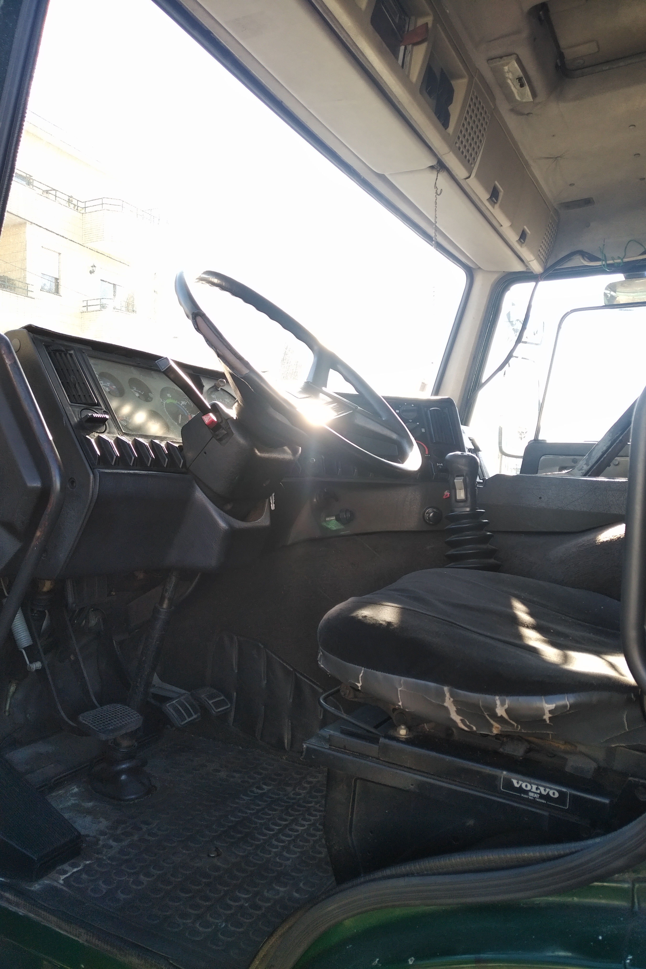 Left hand drive Volvo FL10 320 6X2 10 tyres 26 ton curtainsider truck recently sold to Lagos - Nigeria.