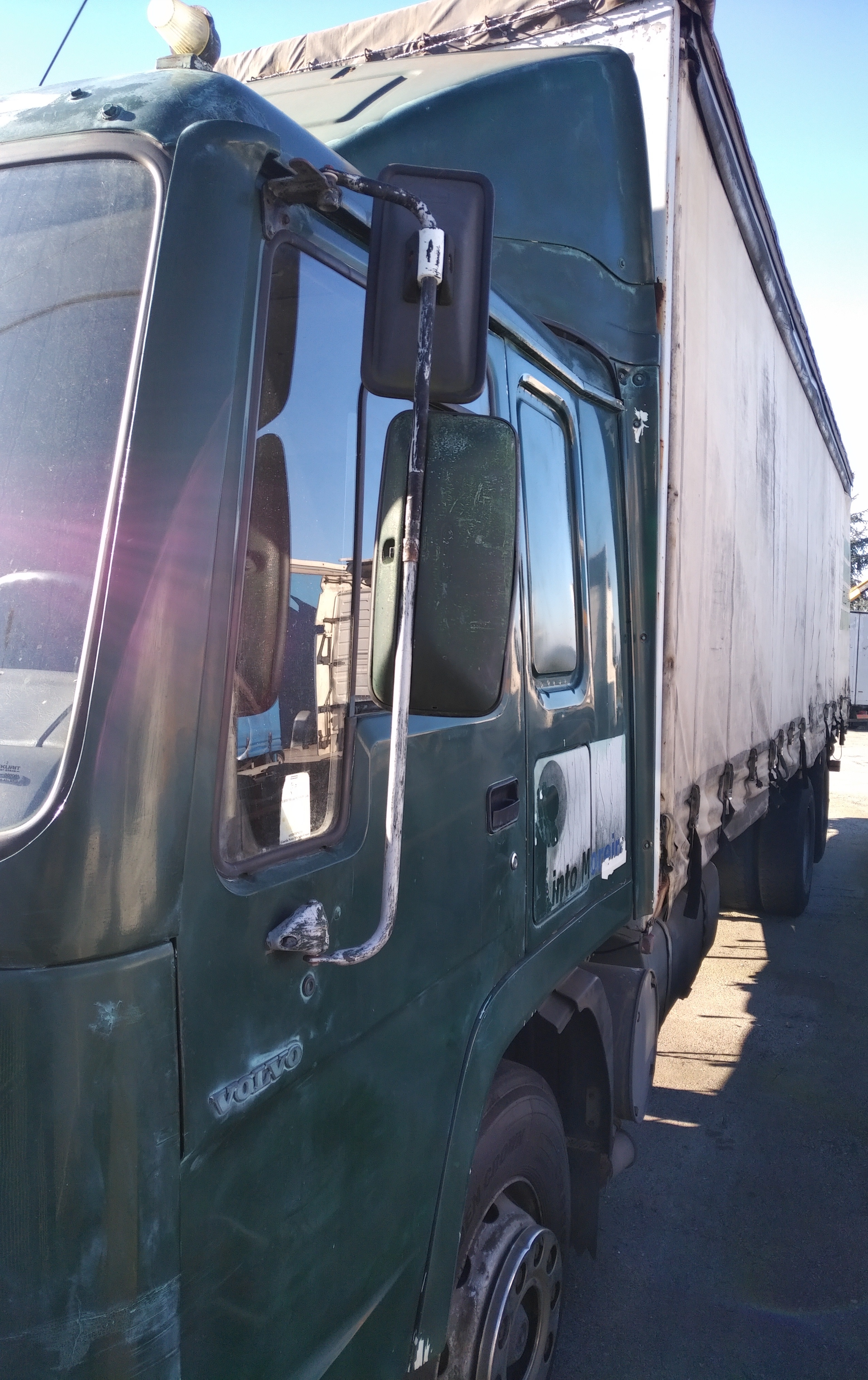 Left hand drive Volvo FL10 320 6X2 10 tyres 26 ton curtainsider truck recently sold to Lagos - Nigeria.