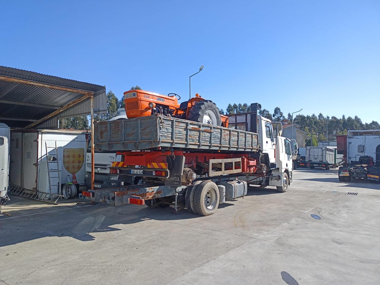 Grimaldi RoRo shipping of DAF CF 75.310 chassis cab truck loaded with Volvo FL7 tipper and two FIAT 640 farm tractors.