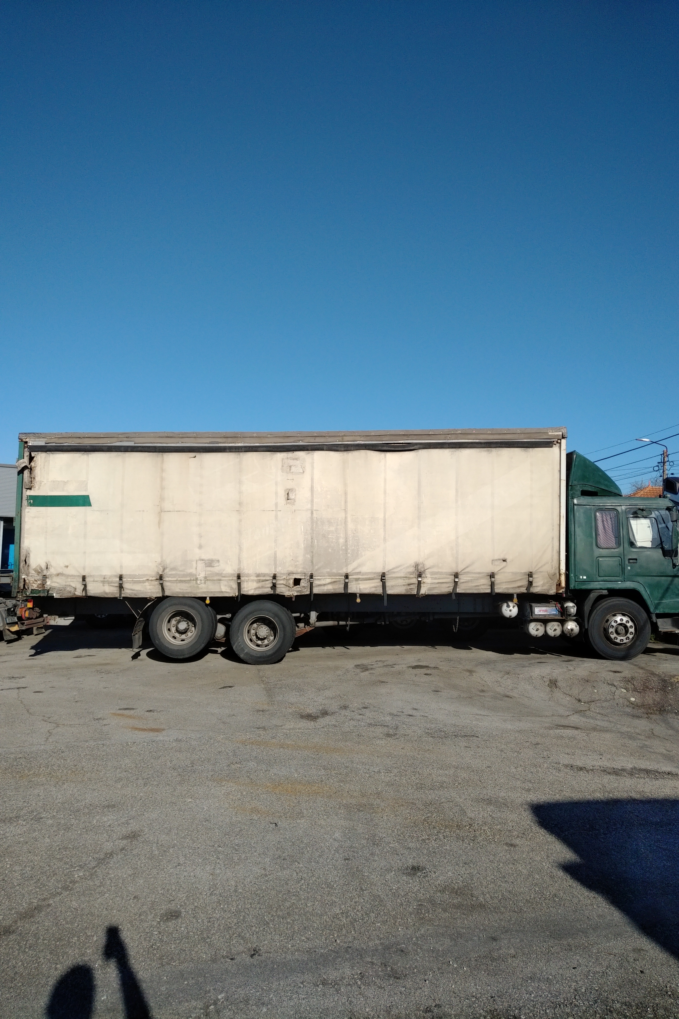 Left hand drive Volvo FL10 320 6X2 10 tyres 26 ton curtainsider truck recently sold to Lagos - Nigeria.