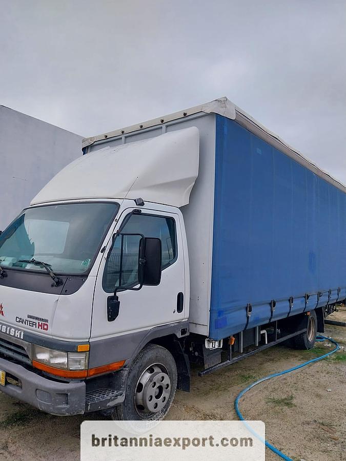 Left Hand Drive Mitsubishi Canter FE659 7.5 Ton Curtainsider Truck for Sale – Export Ready