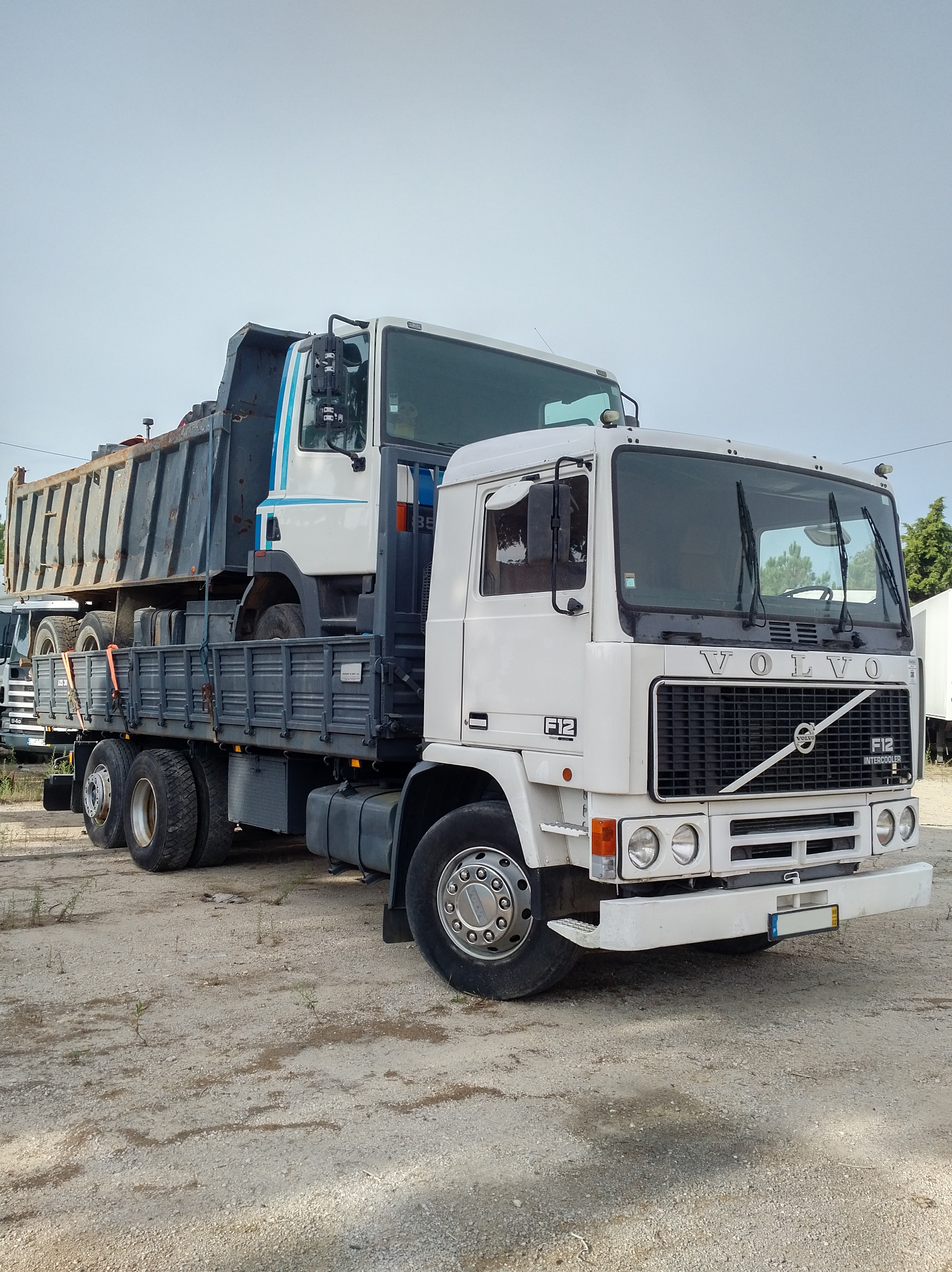 Volvo F12 360 6X2 tipper loaded with DAF 85 360 ATI 6X4 tipper & 2 x FIAT 640 farm tractors sold to Nigeria.