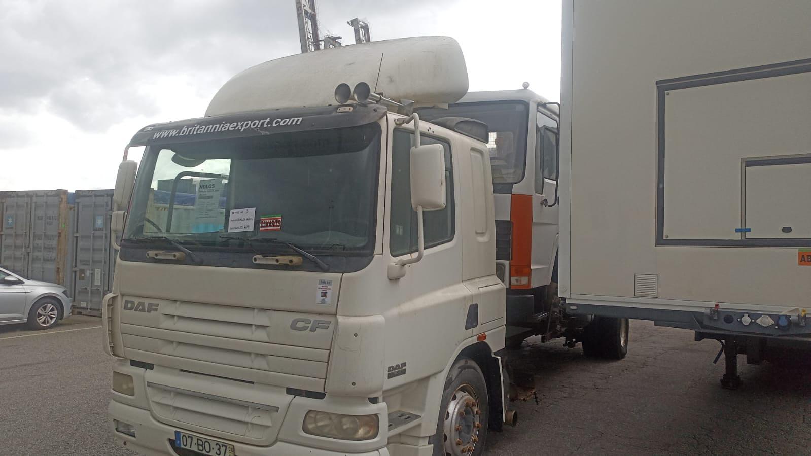 Grimaldi RoRo shipping of DAF CF 75.310 chassis cab truck loaded with Volvo FL7 tipper and two FIAT 640 farm tractors.