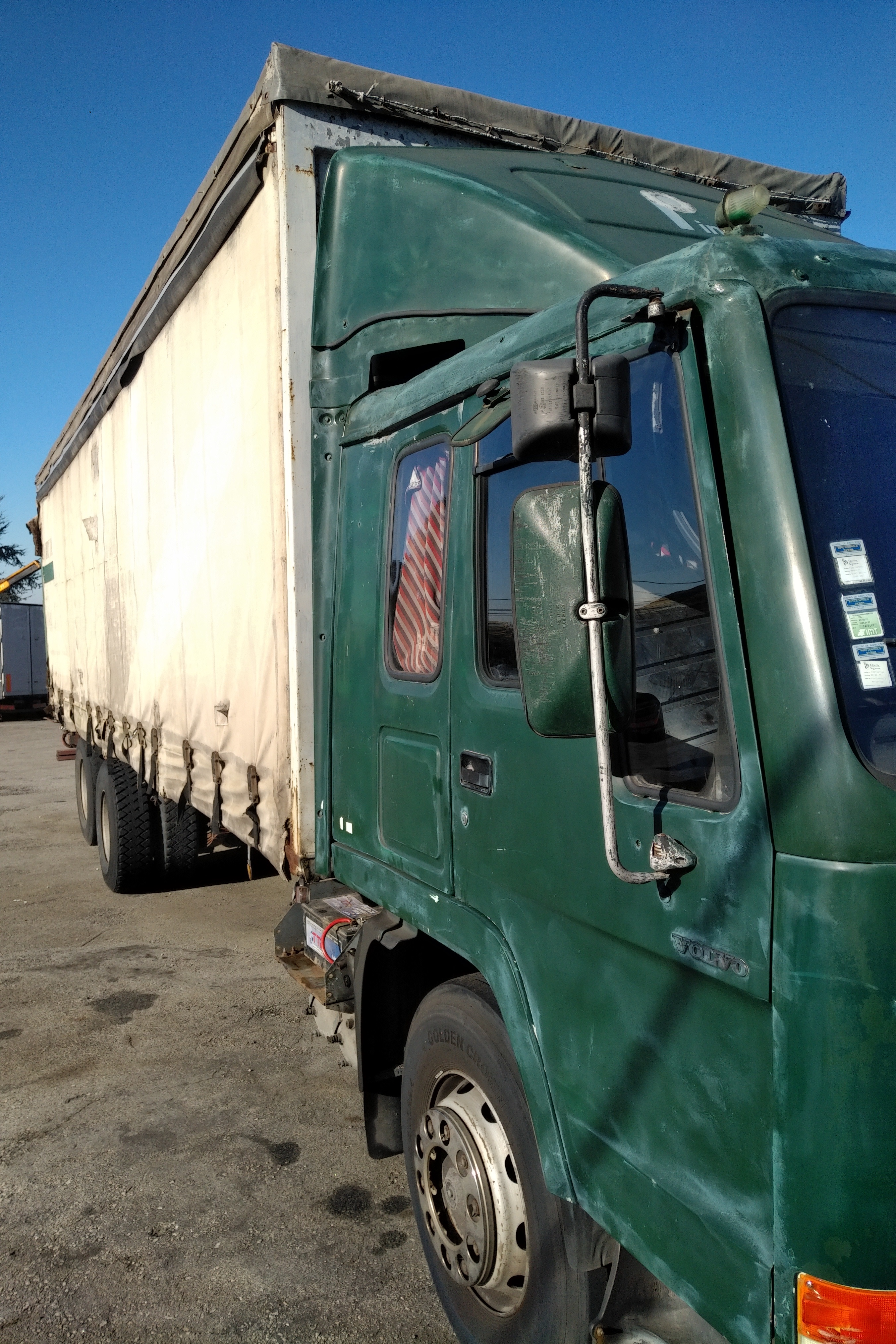 Left hand drive Volvo FL10 320 6X2 10 tyres 26 ton curtainsider truck recently sold to Lagos - Nigeria.