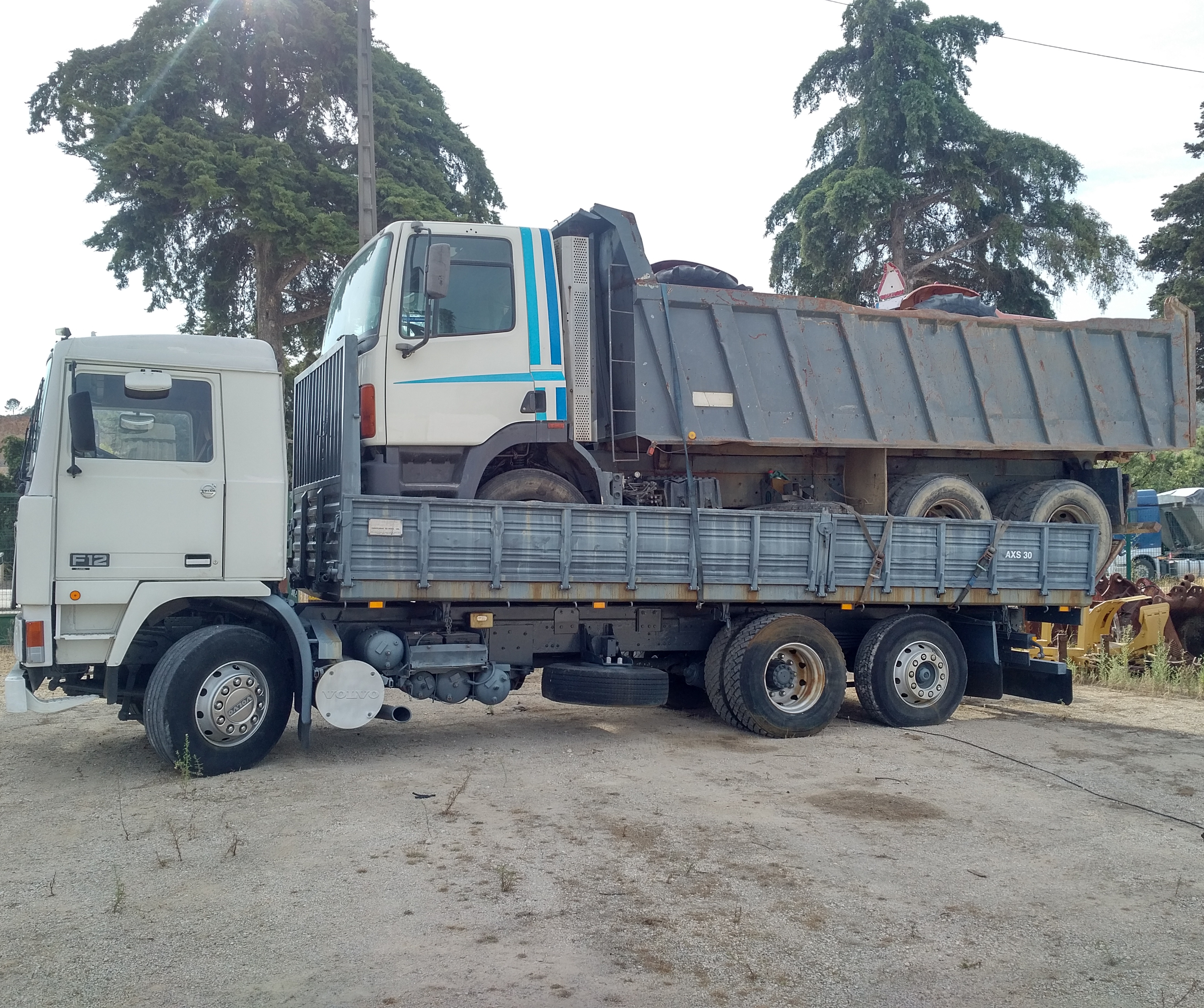 Volvo F12 360 6X2 tipper loaded with DAF 85 360 ATI 6X4 tipper & 2 x FIAT 640 farm tractors sold to Nigeria.