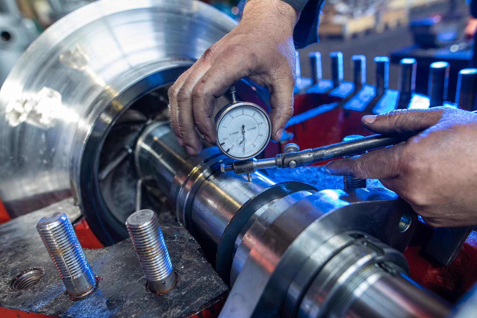 Dial indicator measuring a machine component