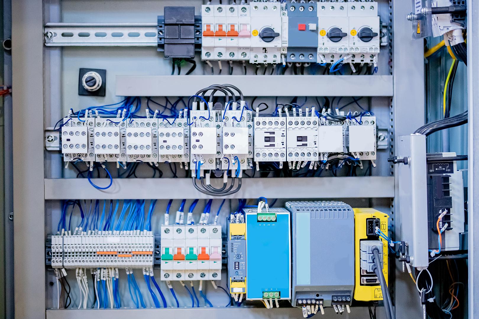 Wired electrical control cabinet with breakers and relays