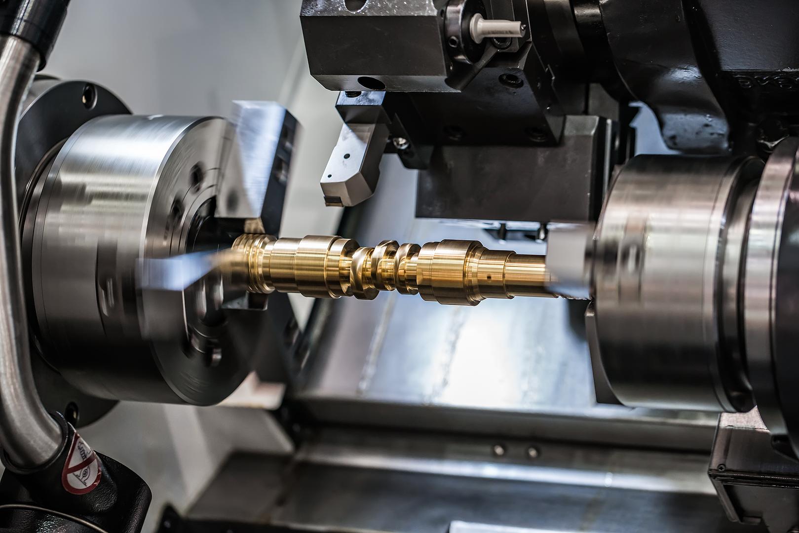 CNC lathe machining a brass part