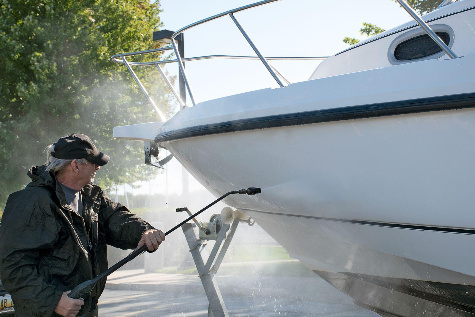 Boat hull being pressure washed