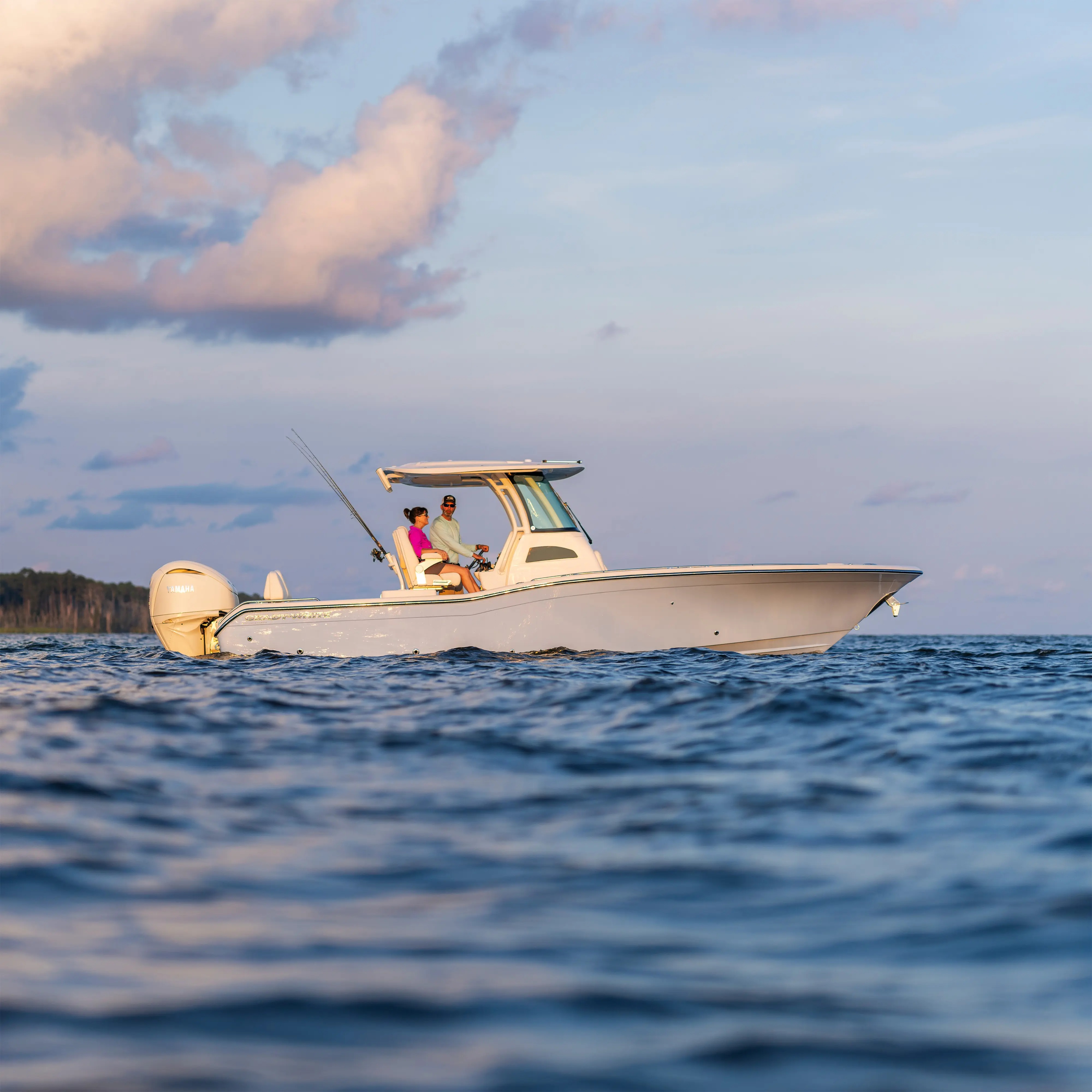 Grady-White center console boat cruising on open water