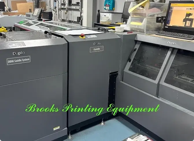 Used Duplo DB-Mi saddle system with DSF-6000 sheet feeder and cover feeder