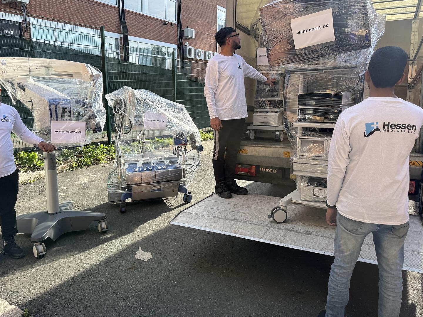 A member of the Hessen Medical team logging equipment on arrival in the warehouse.