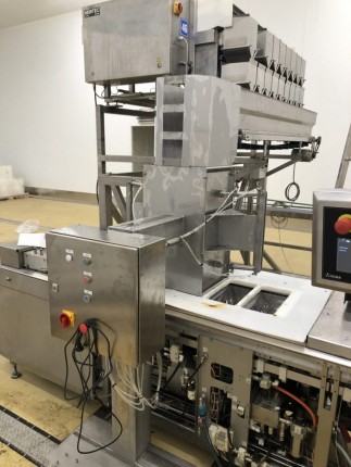 AUTOMATIC WEIGHING, FILLING AND THERMOFORMING LINE