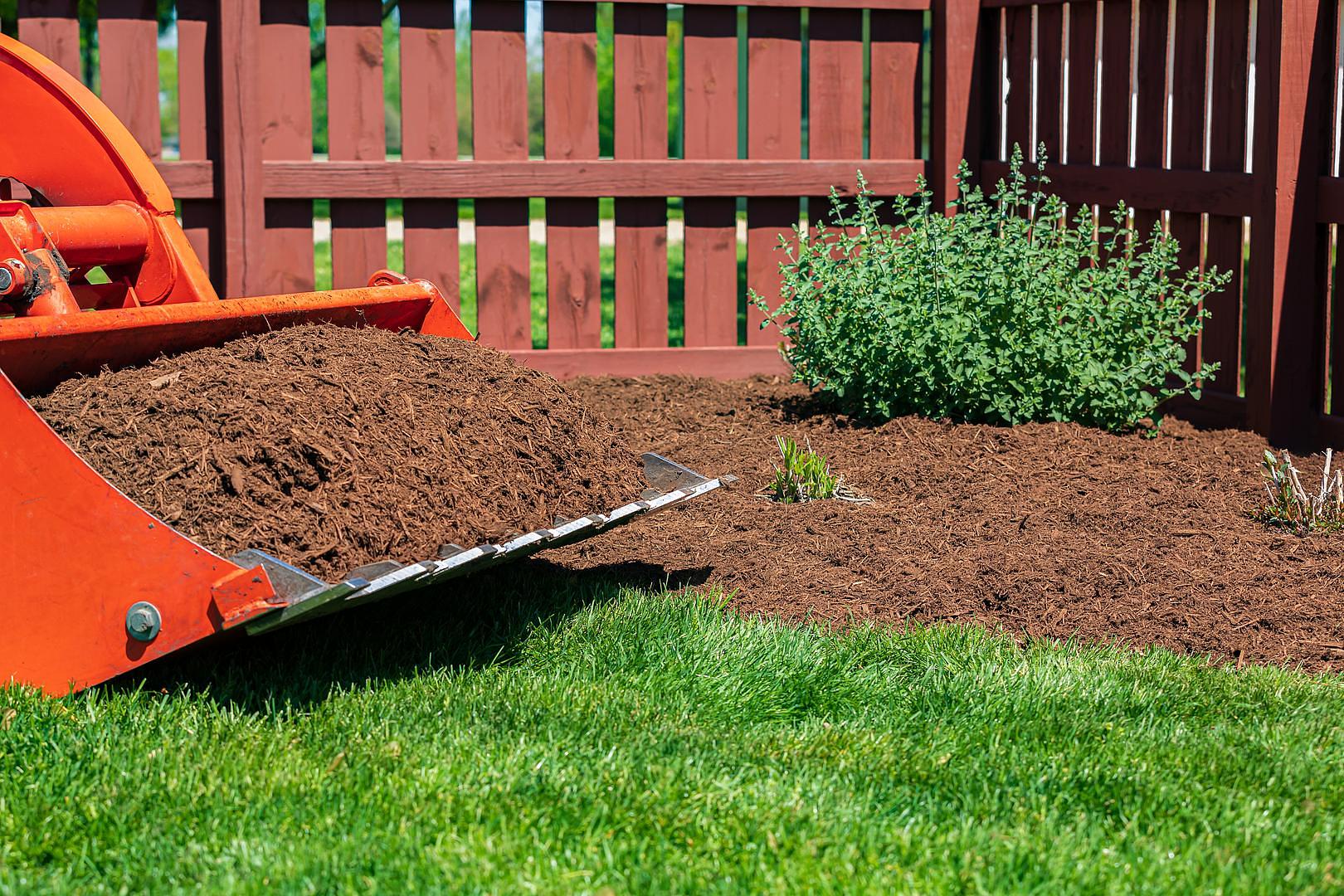 Ceasars screener processing topsoil on a landscaping job site