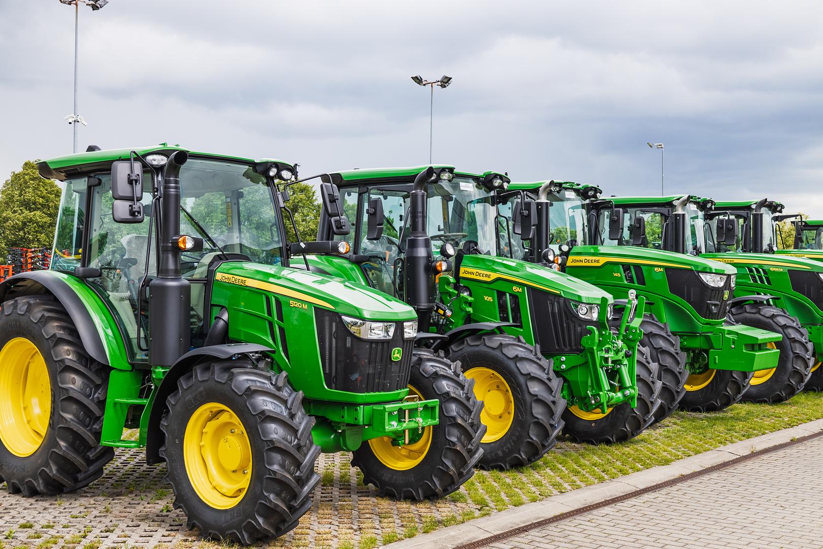 Technician servicing multiple machines for a fleet customer