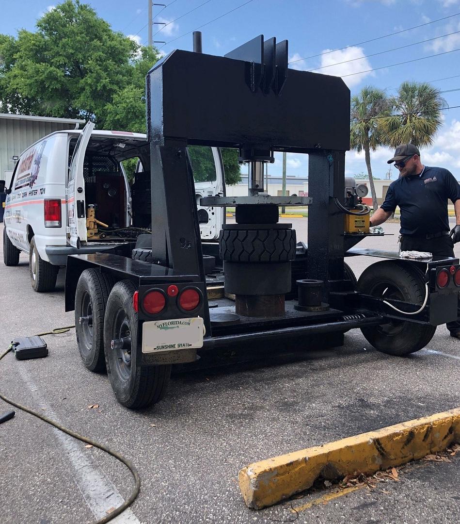 Mobile forklift tire press in the field