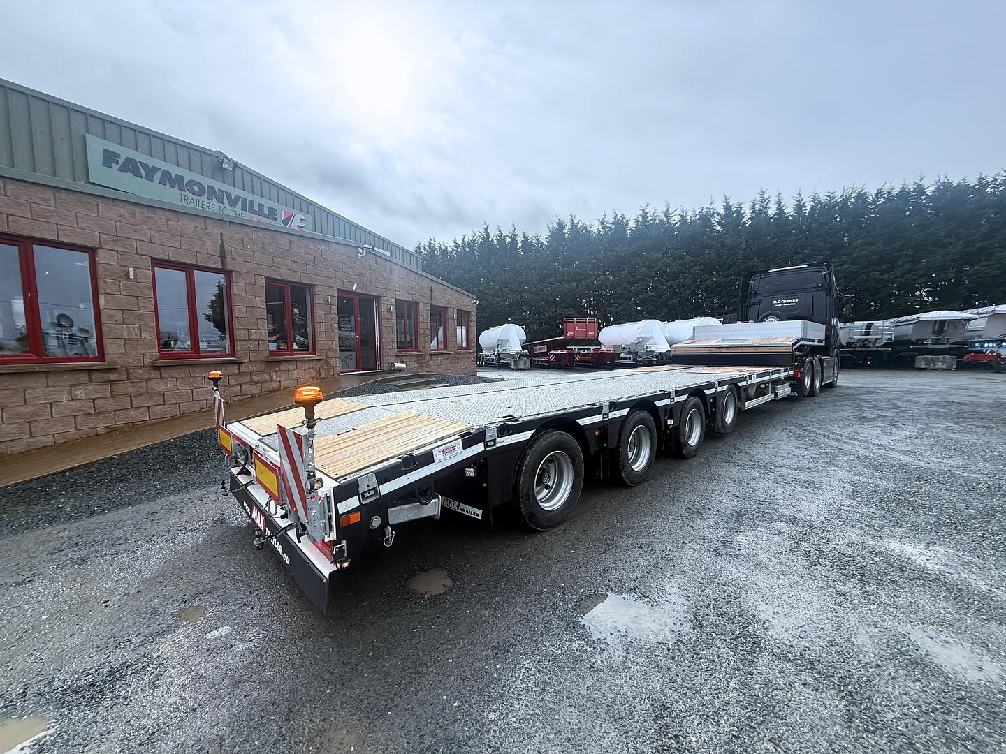 JLC Cranes, on collection of their New MAX Trailer, 4 axle power steered step frame