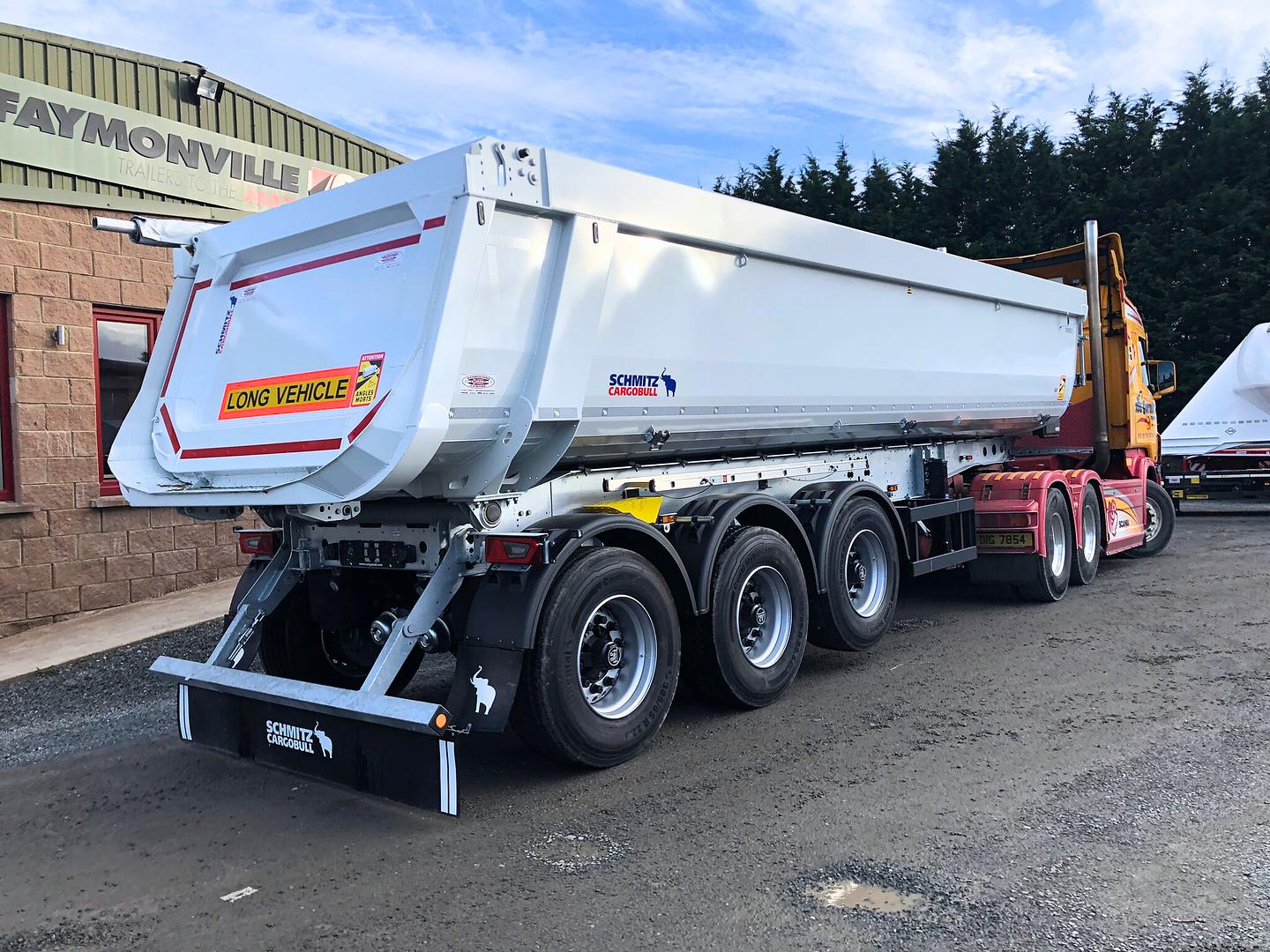Mc Cormick Contracts Ltd on collection of New Schmitz tipping trailer