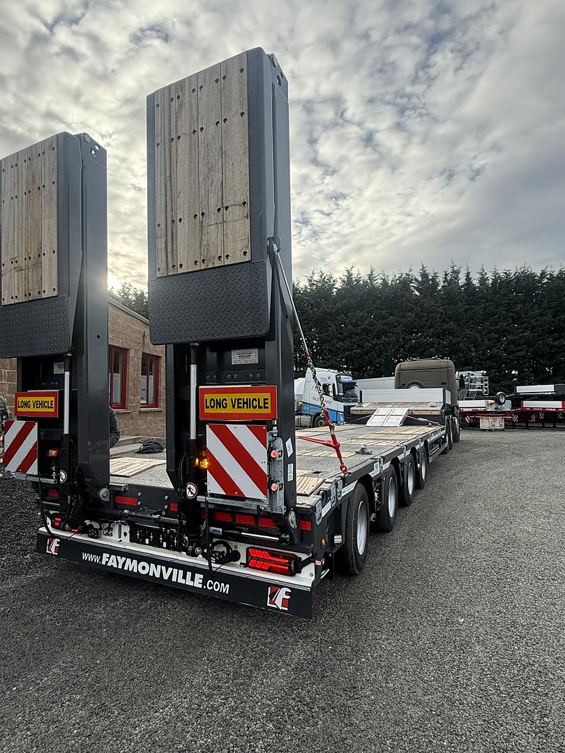 Department of Defence, on collection of new Faymonville 4 axle step frame low loader. 