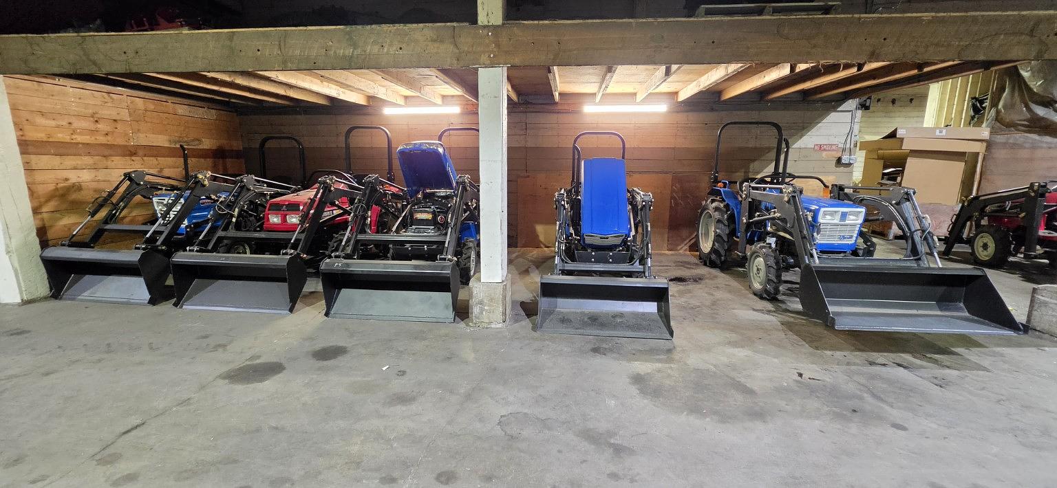 TractorCo service bay with a tractor