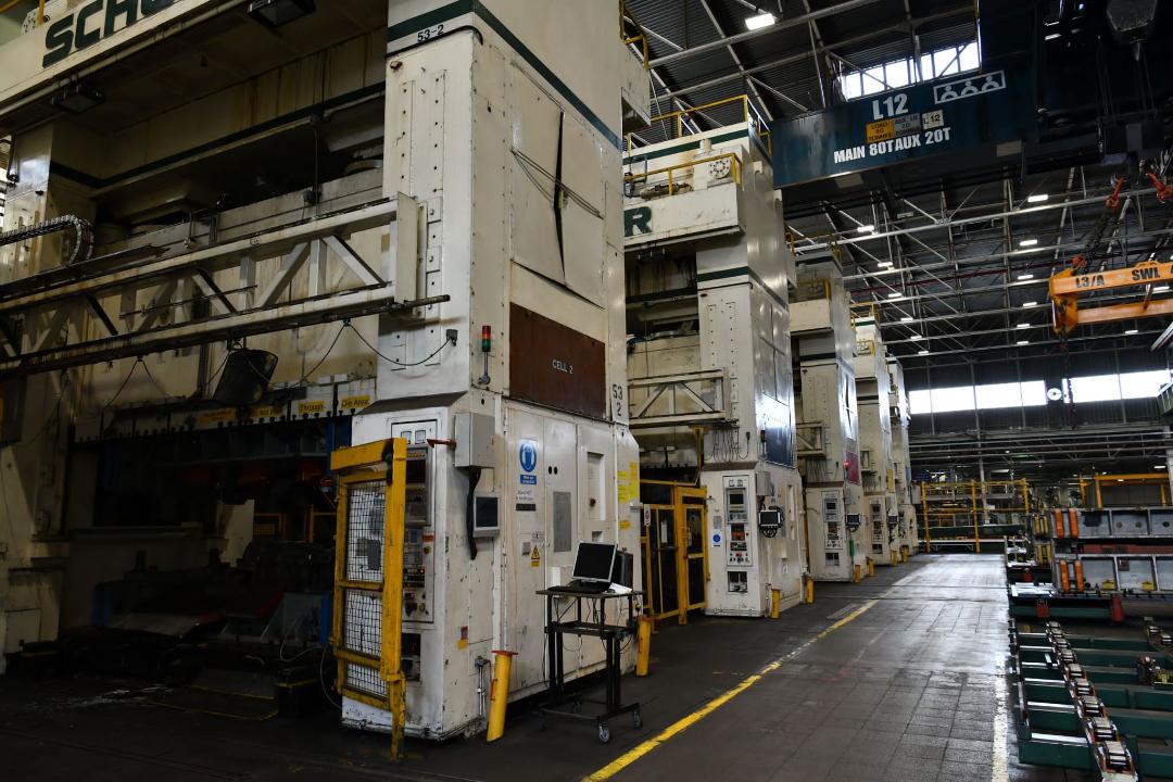 11 Large automotive metal forming presses for sale.