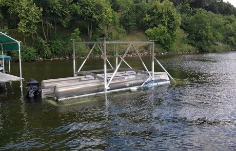 Damaged dock section removed from the lake