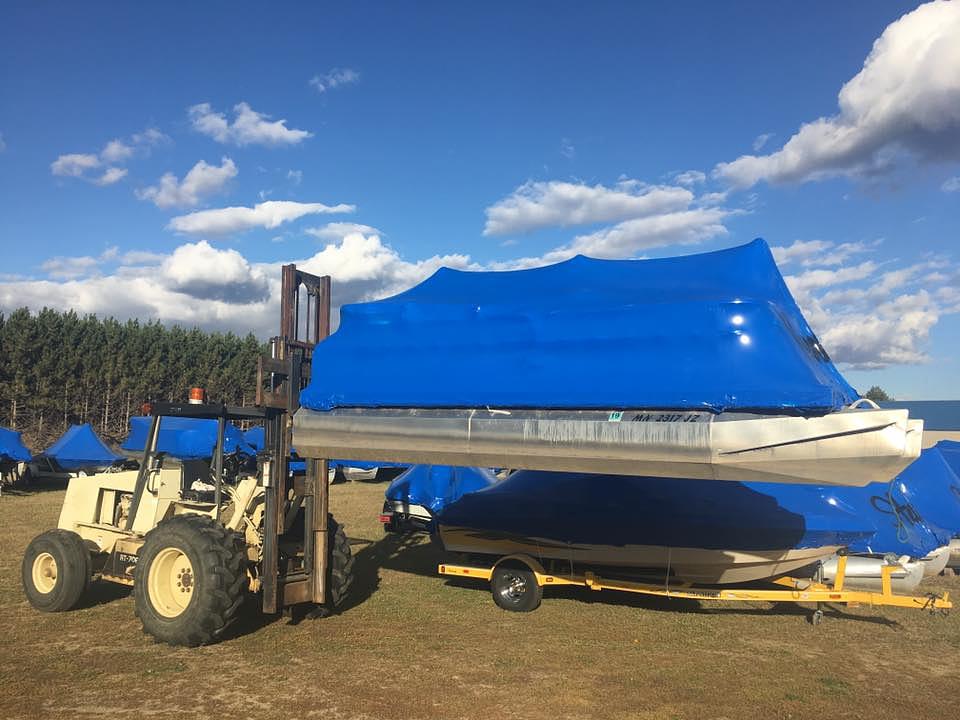Boat shrink wrapping in progress