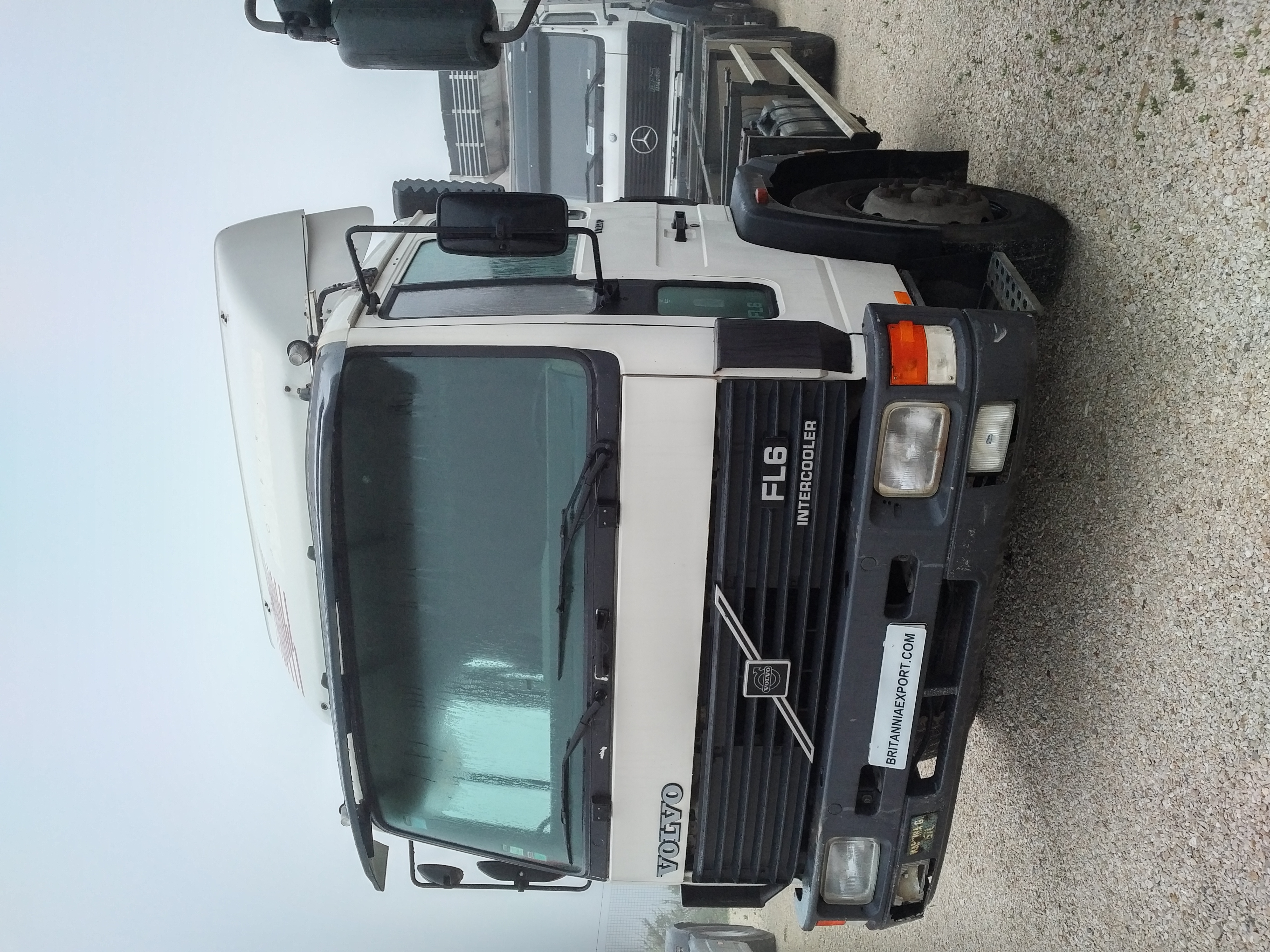 Left hand drive Volvo FL618 210 Intercooler 18 ton flatbed truck sold to Lagos - Nigeria.